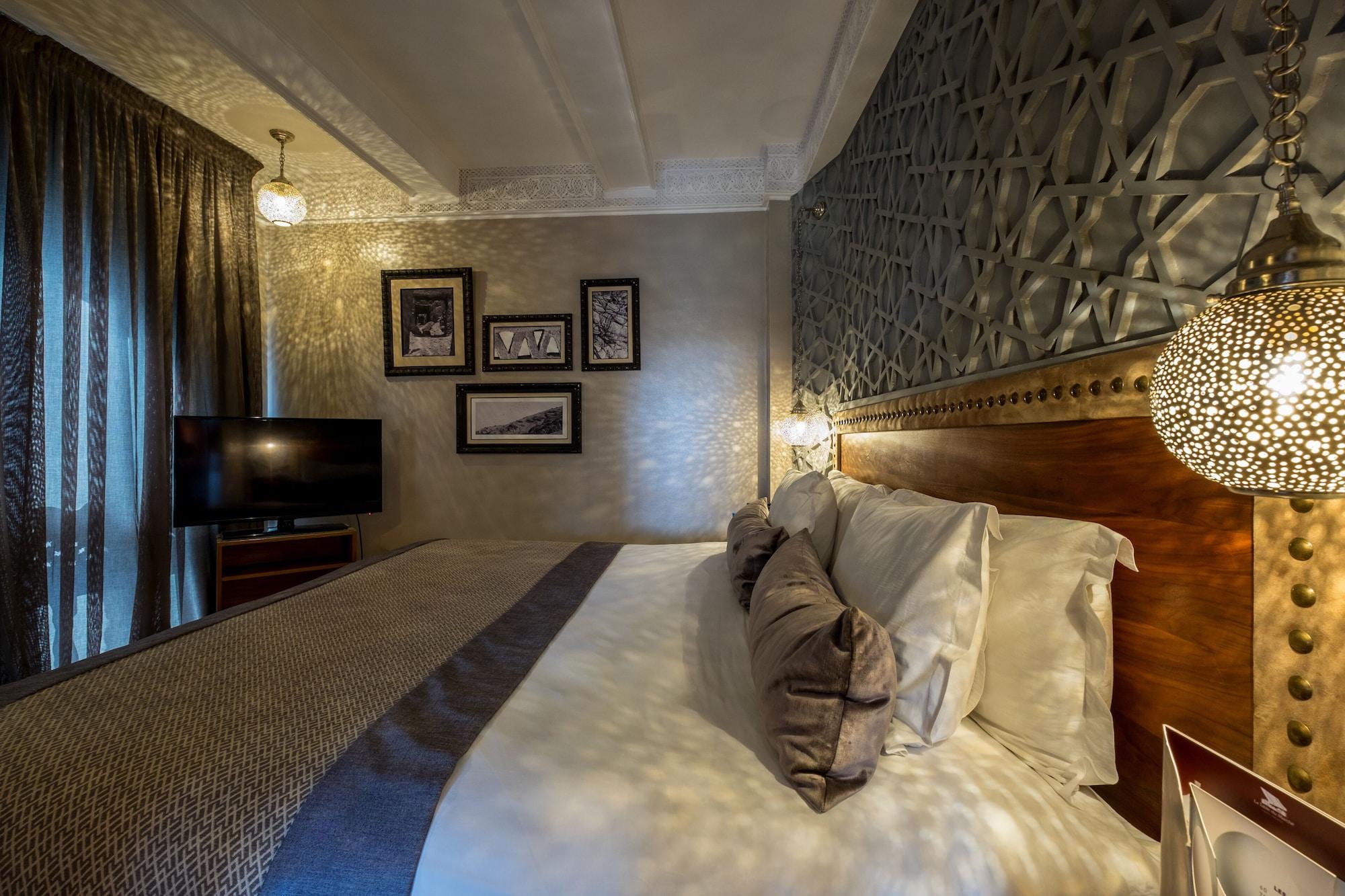 Hivernage Hotel & Spa Marakeş Dış mekan fotoğraf A bedroom at the hotel